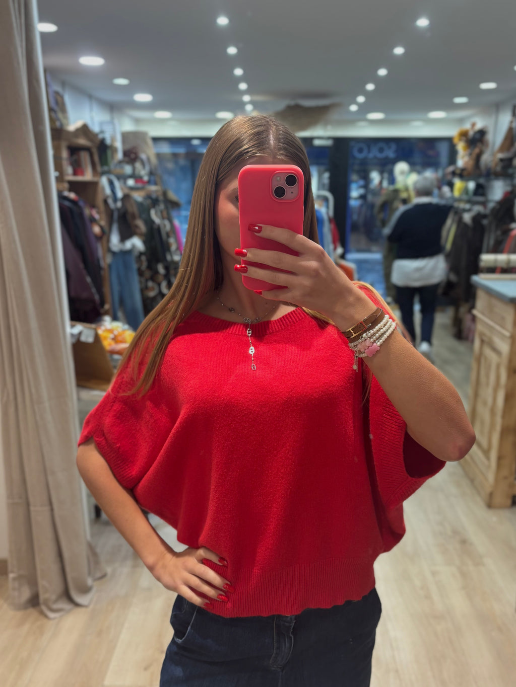 Pull rouge sans manches à col rond