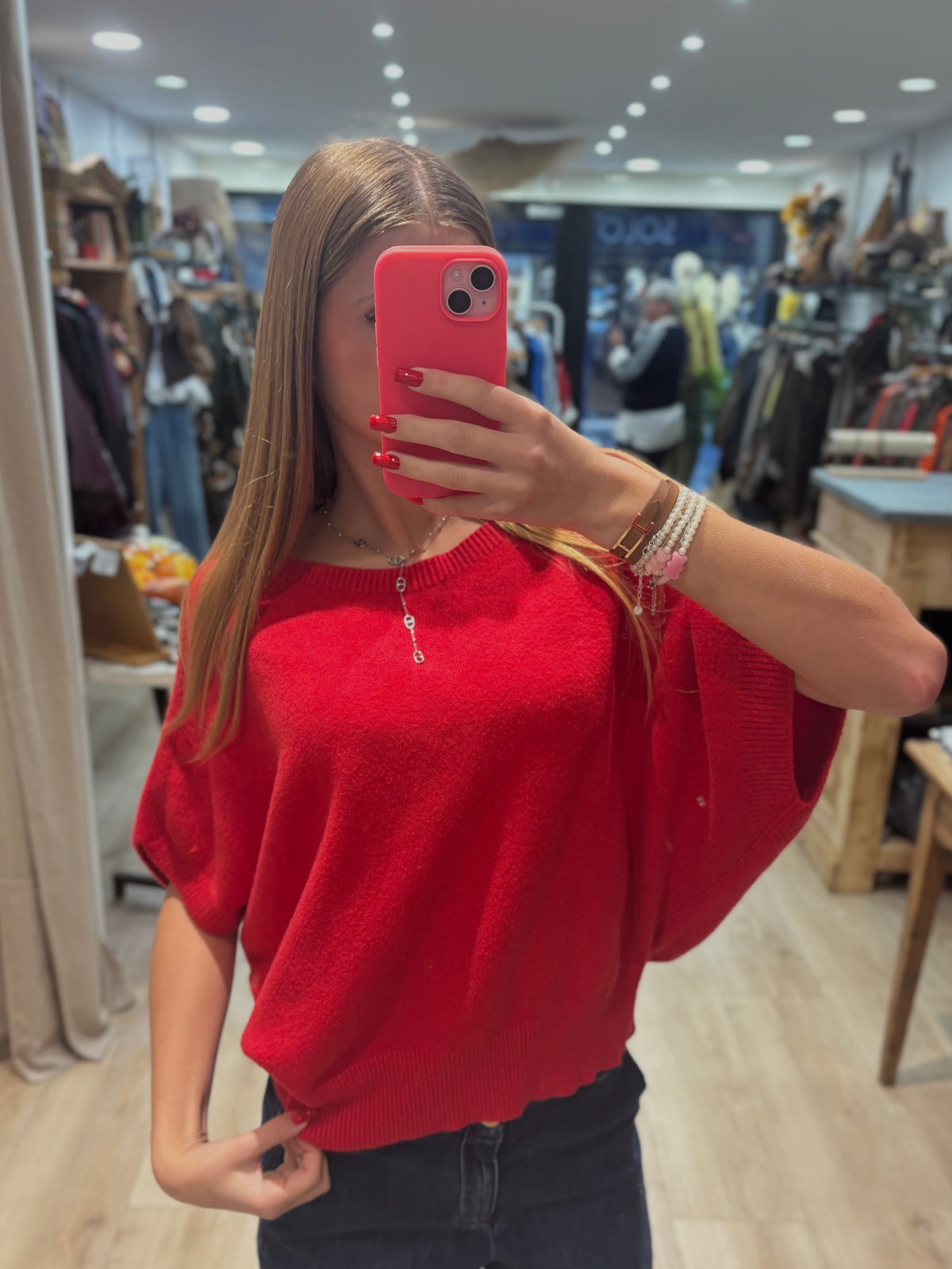 Pull rouge sans manches à col rond
