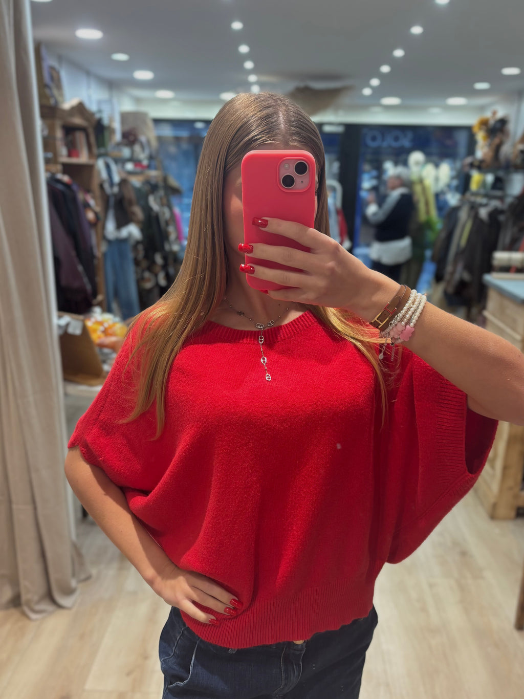 Pull rouge sans manches à col rond