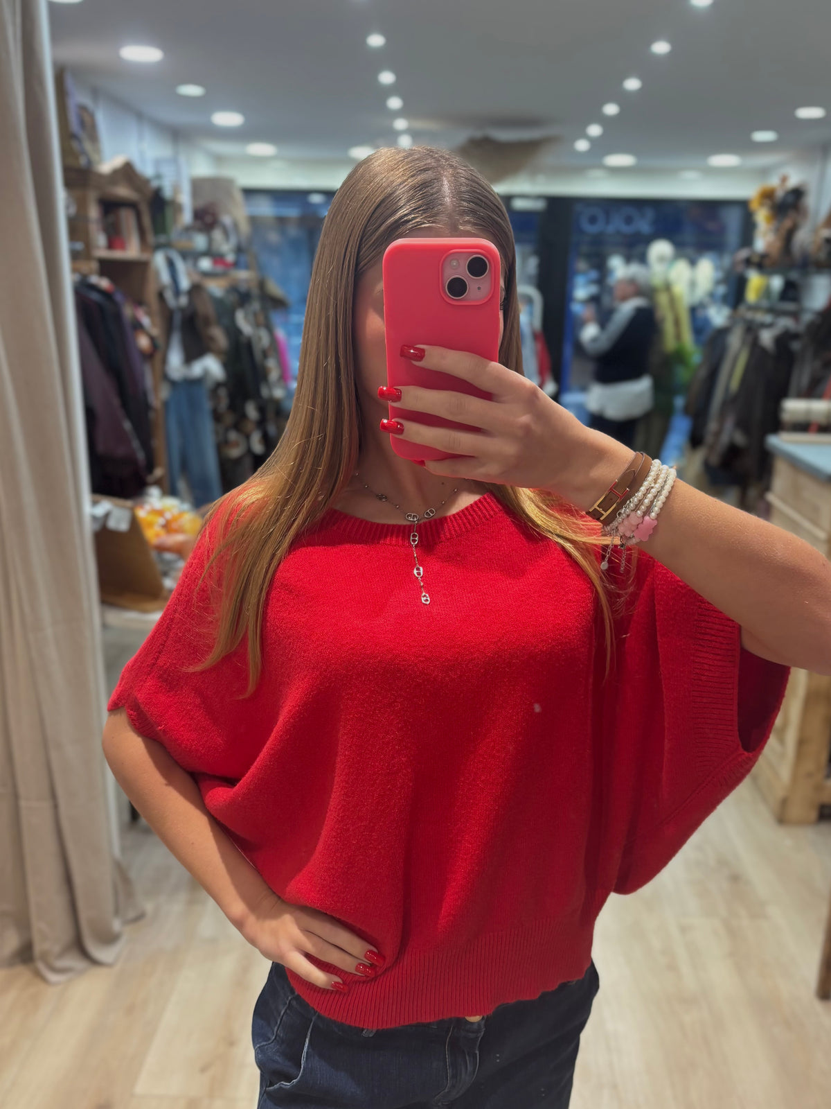 Pull rouge sans manches à col rond