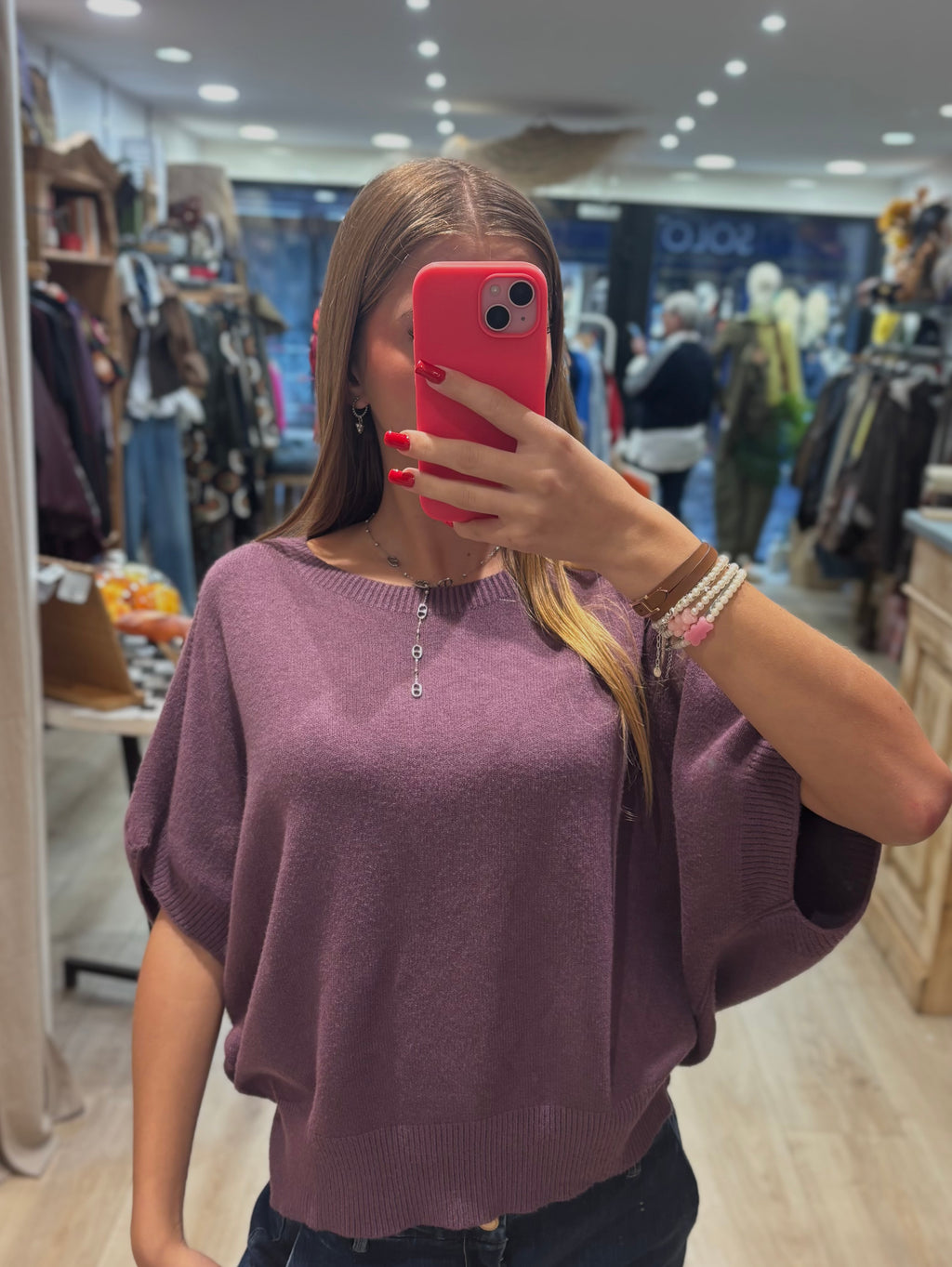 Pull mauve sans manches à col rond