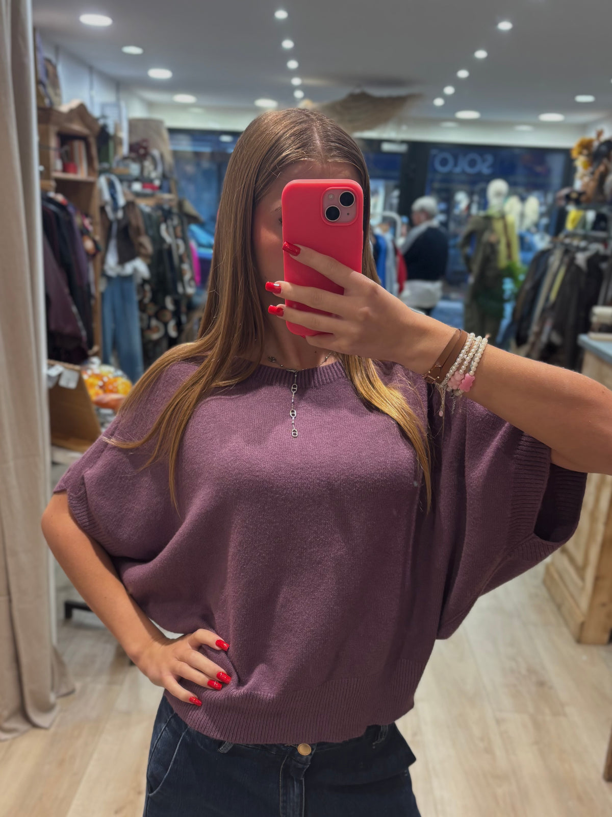 Pull mauve sans manches à col rond