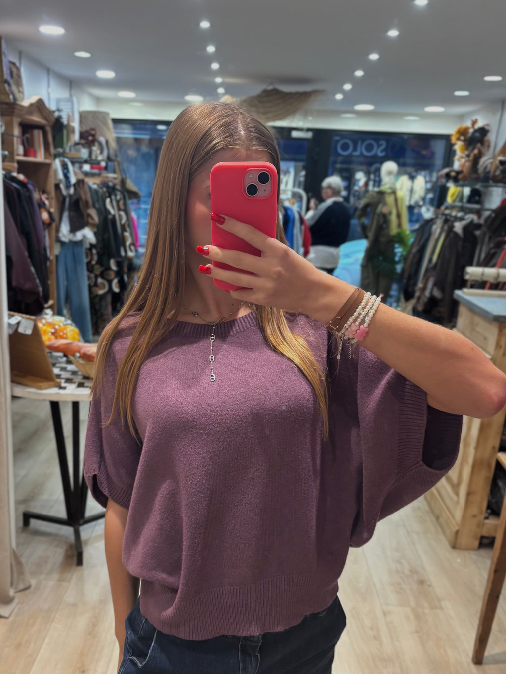 Pull mauve sans manches à col rond