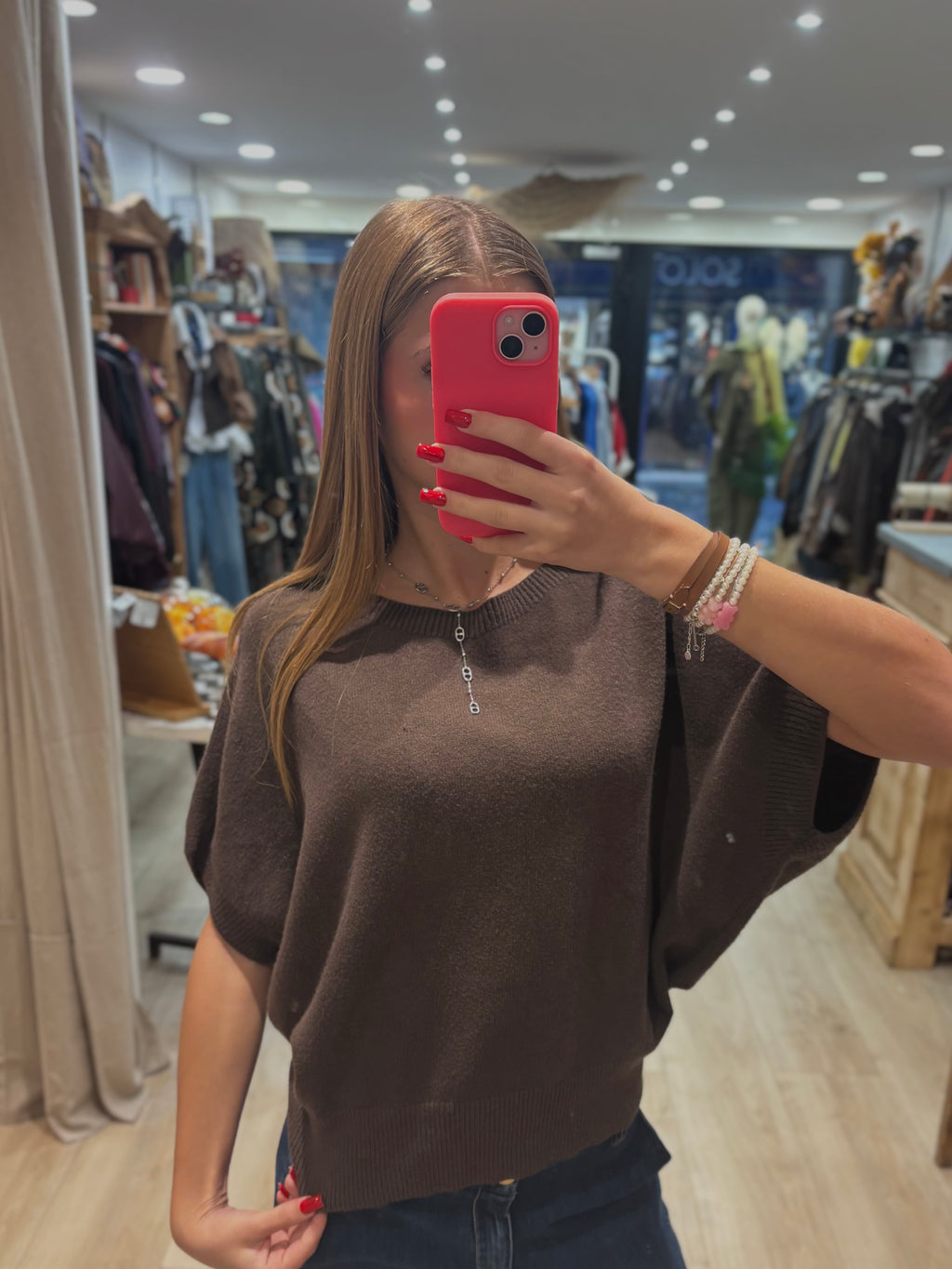 Pull marron sans manches à col rond