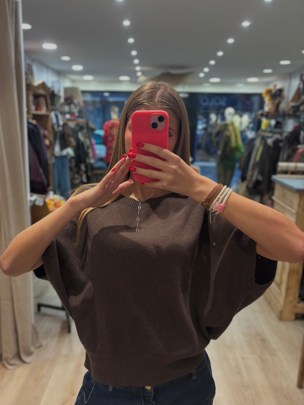 Pull marron sans manches à col rond