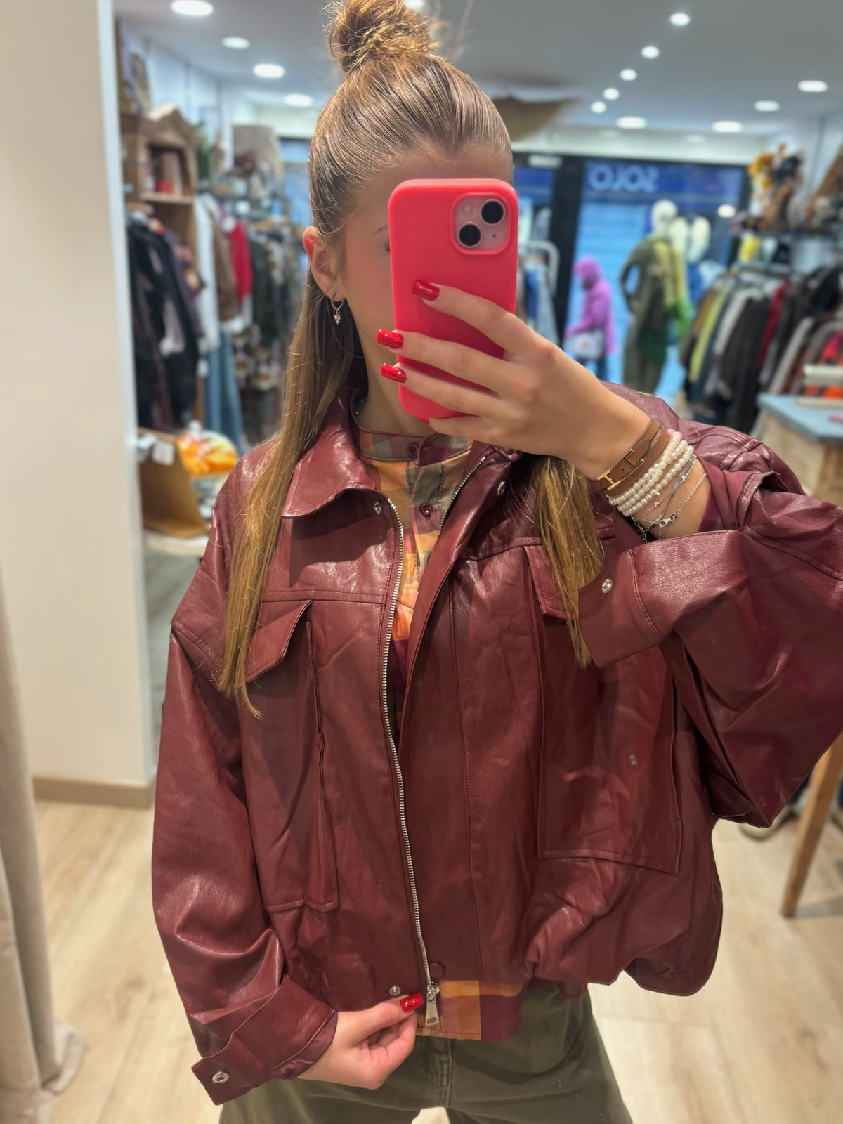 Veste courte zippée à poches poitrine
