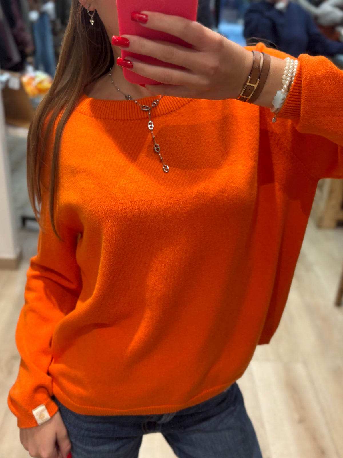 Pull orange ample à col rond