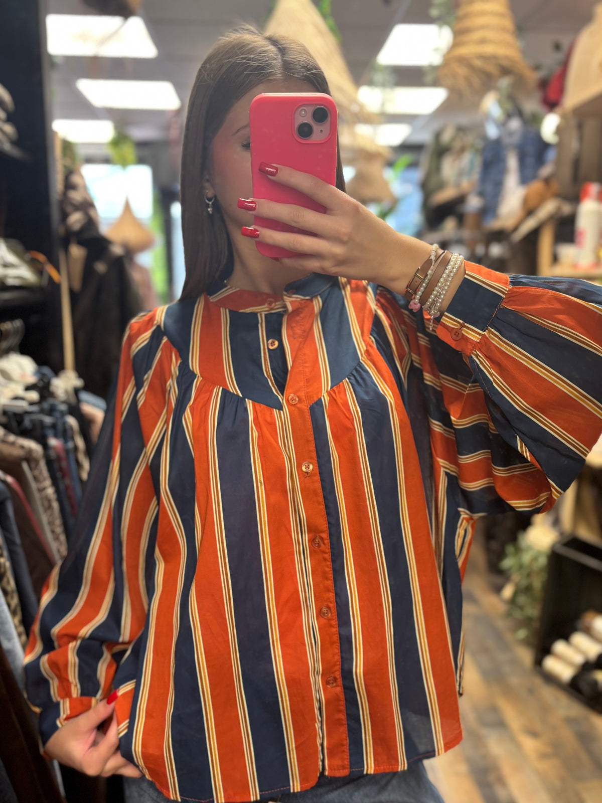 Blouse à rayures orange et bleu marine