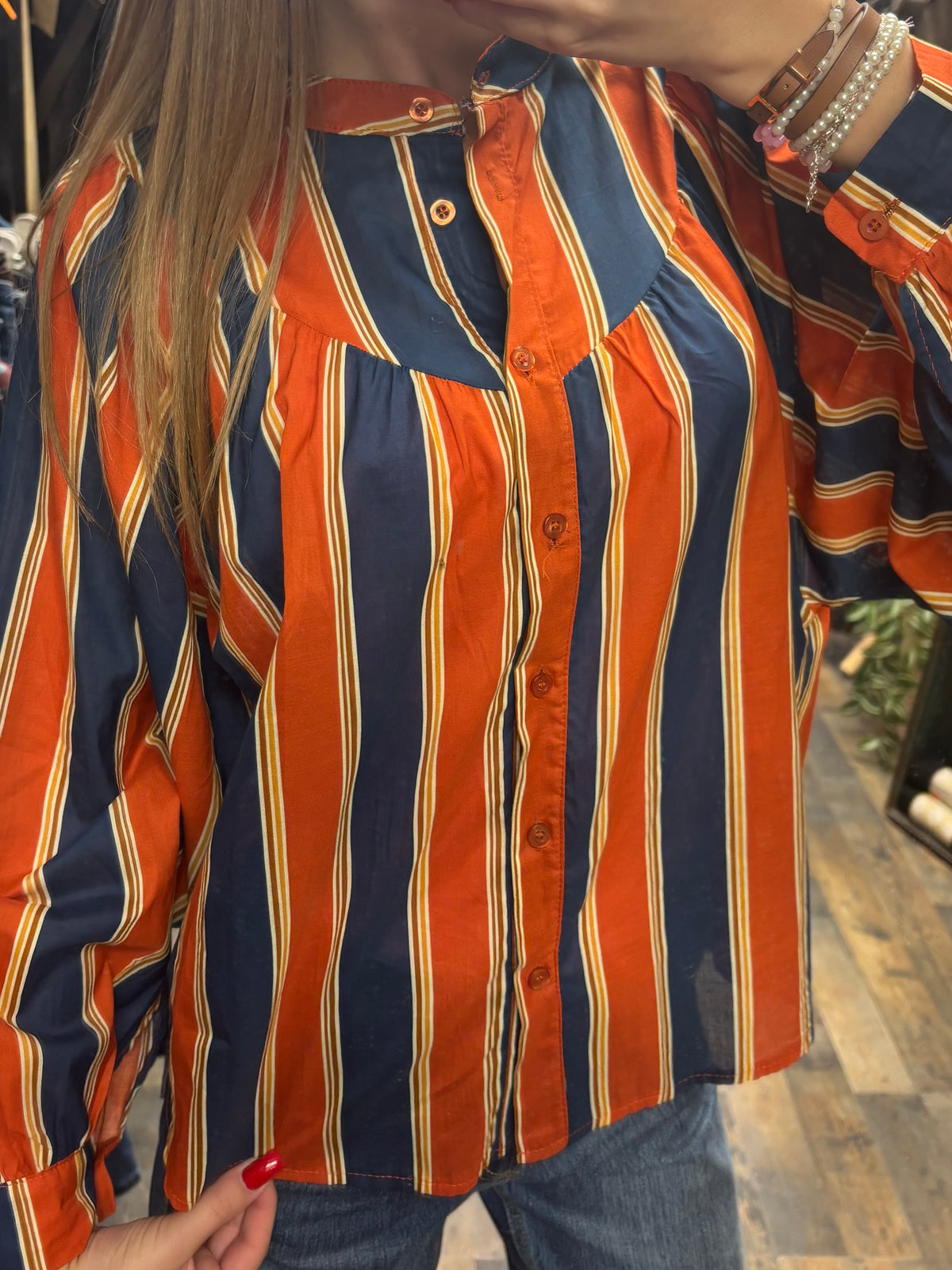 Blouse à rayures orange et bleu marine