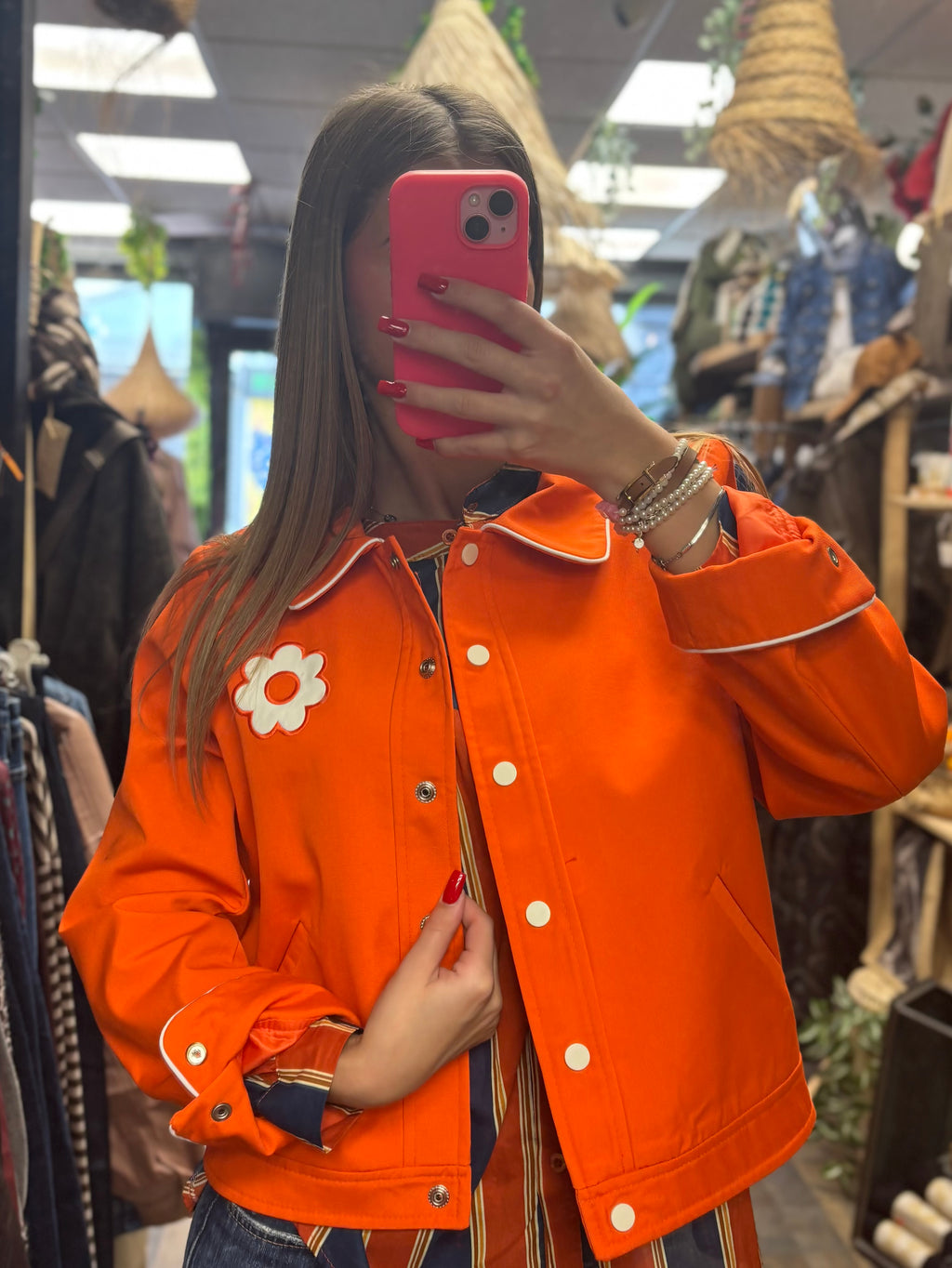 Veste à détail fleur et finitions contrastées