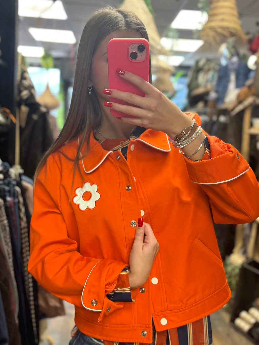 Veste à détail fleur et finitions contrastées