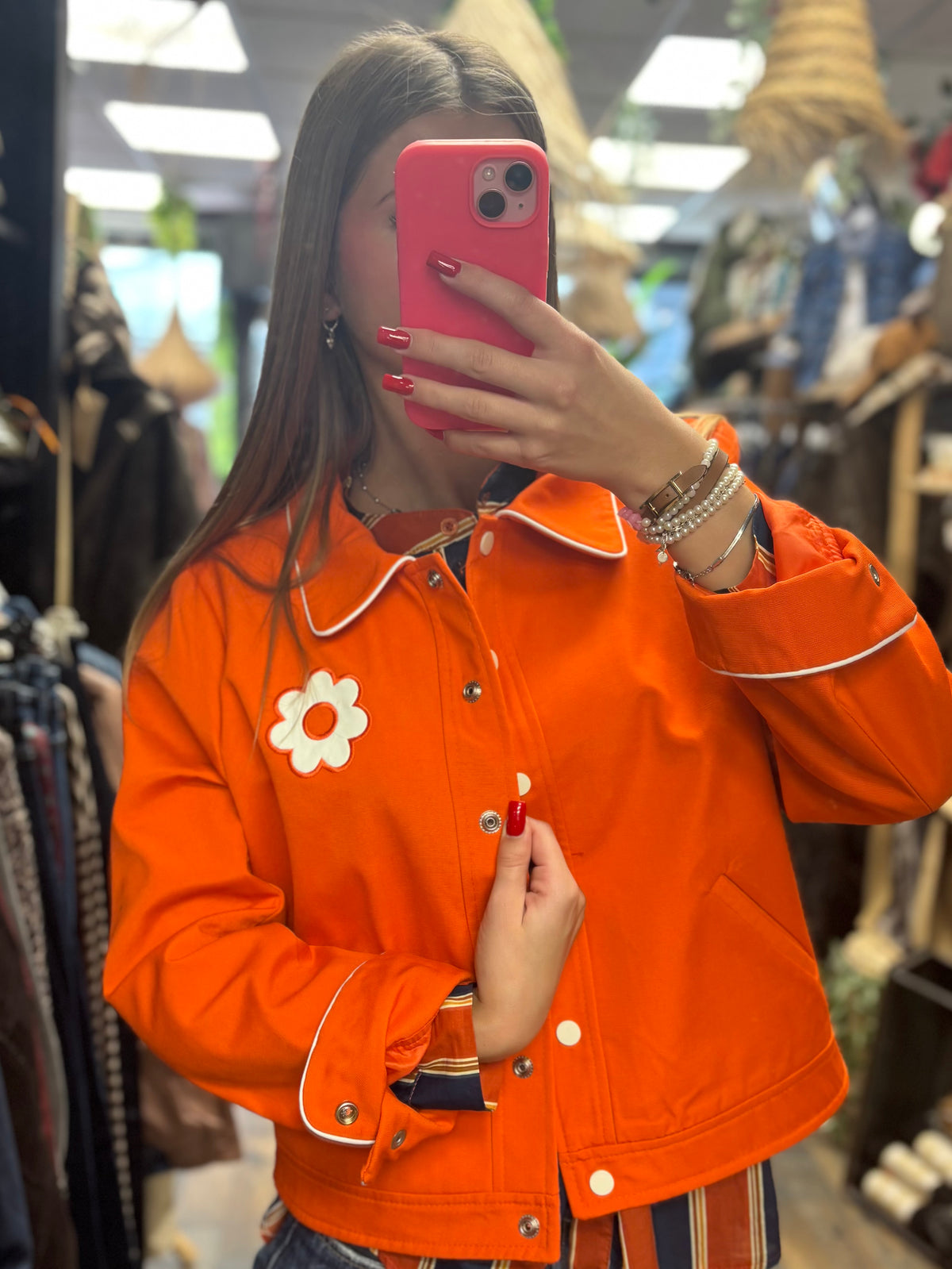 Veste à détail fleur et finitions contrastées