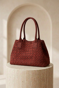 Sac à main à l’aspect tressé avec deux anses arrondies